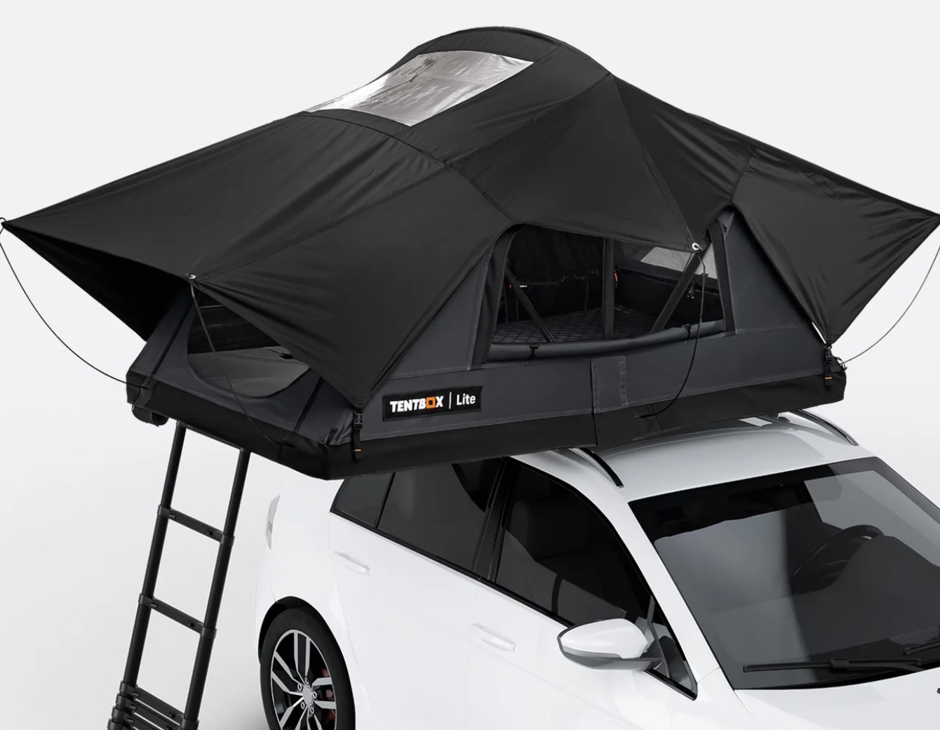 TentBox Lite roof tent fitted to a white car