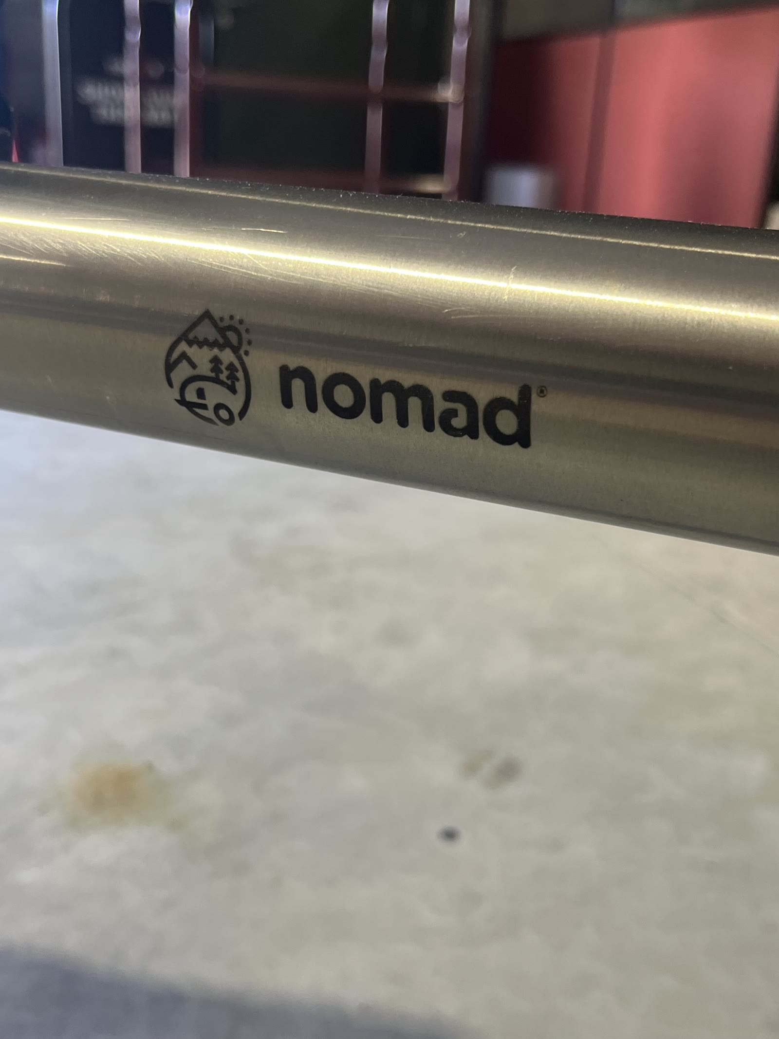 Nomad logo marked on a trailer chassis in the workshop